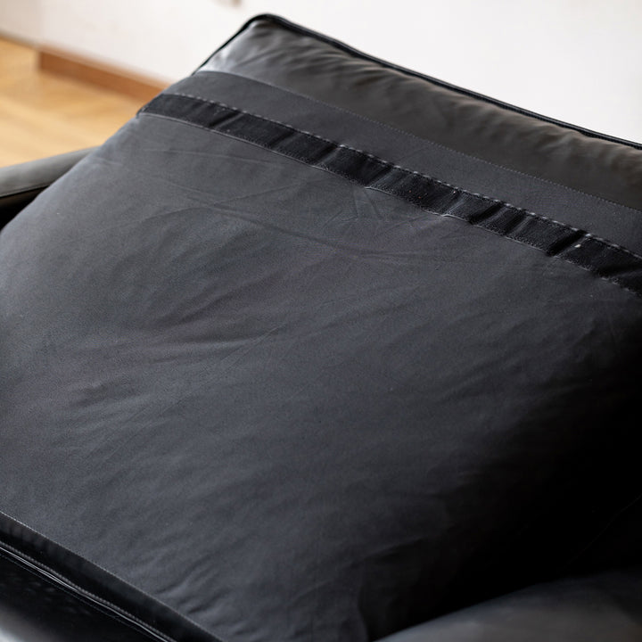 Minimalist genuine leather 1 seater sofa unique in close up details.