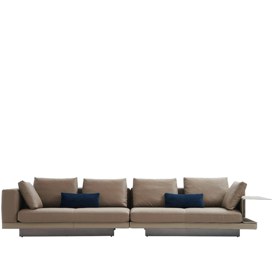 Minimalist genuine leather 4 seater sofa connery in white background.