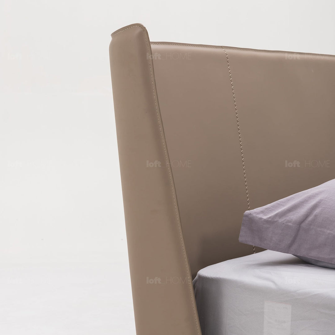 Minimalist genuine leather bed alys in close up details.