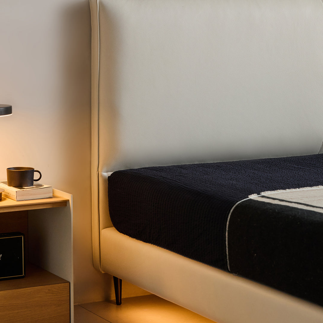 Minimalist genuine leather bed lalo in close up details.