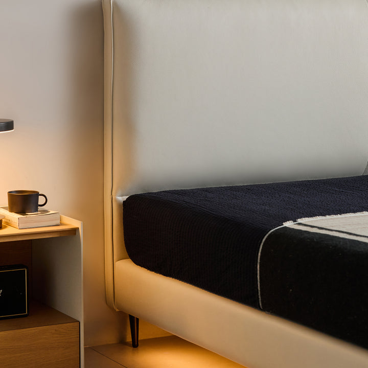 Minimalist genuine leather bed lalo in close up details.