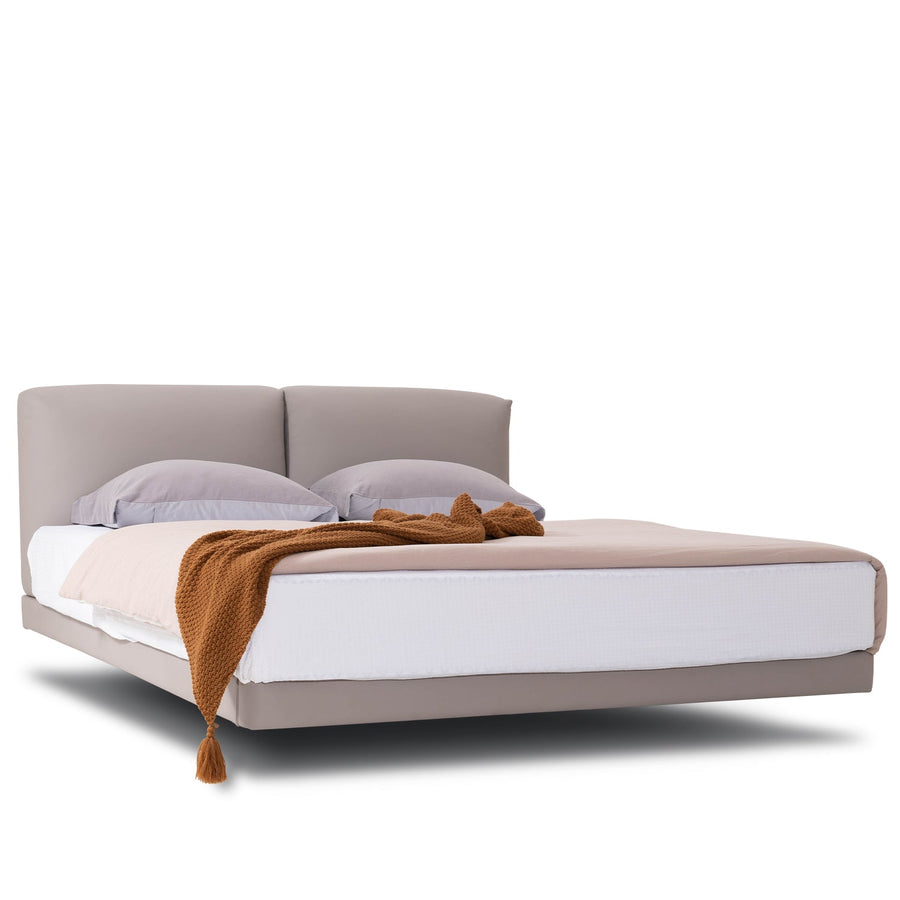 Minimalist genuine leather floating bed bence in white background.