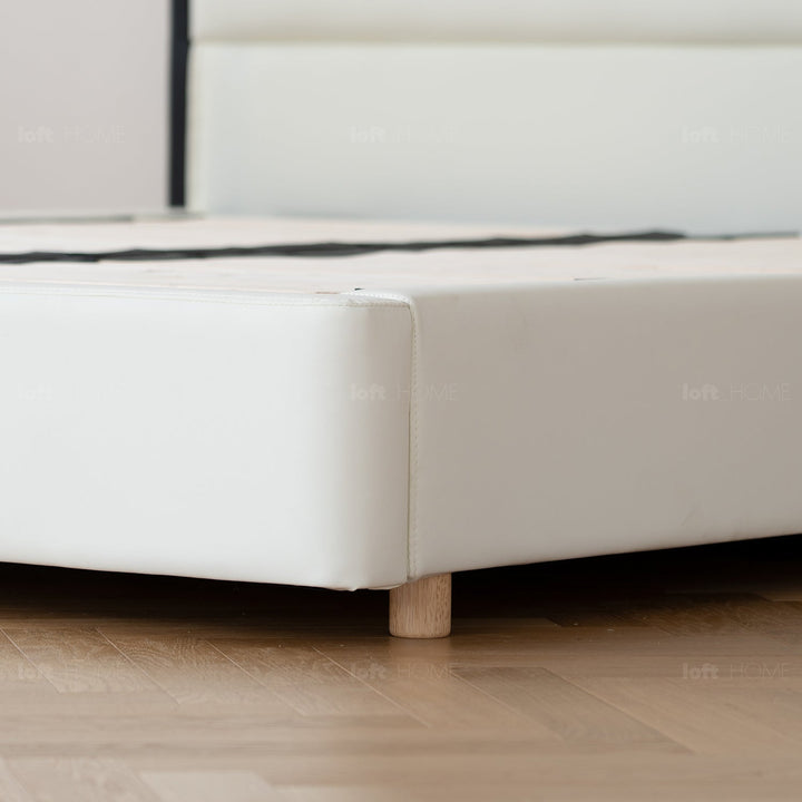 Minimalist leather bed ripple layered structure.
