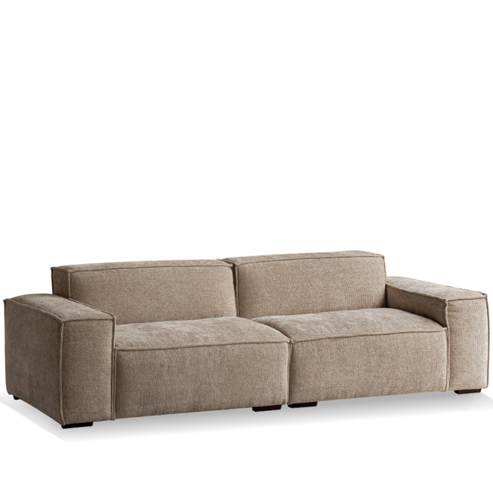 Minimalist linen fabric 4 seater sofa camaleonda in white background.