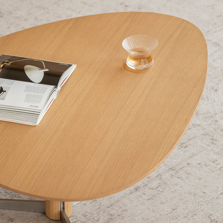 Minimalist oak wood veneer sintered stone coffee table set sol in close up details.