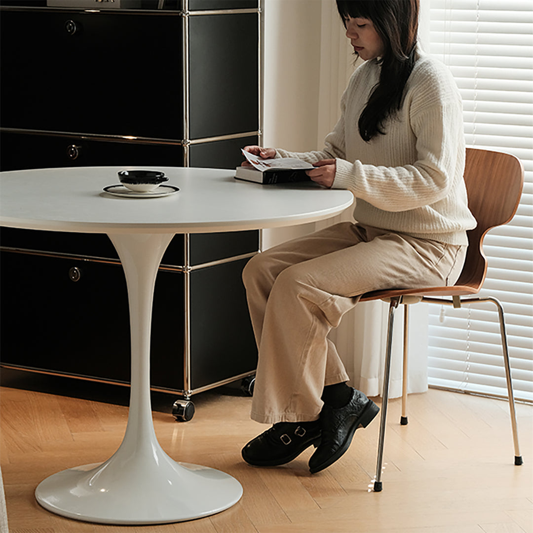 Minimalist plywood round dining table tulip primary product view.