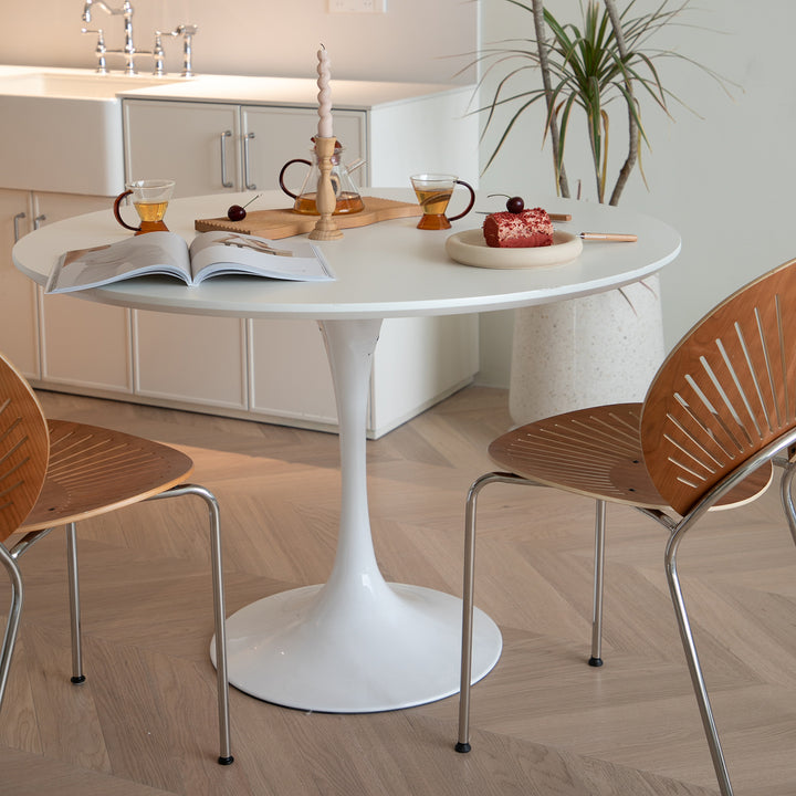 Minimalist plywood round dining table tulip material variants.