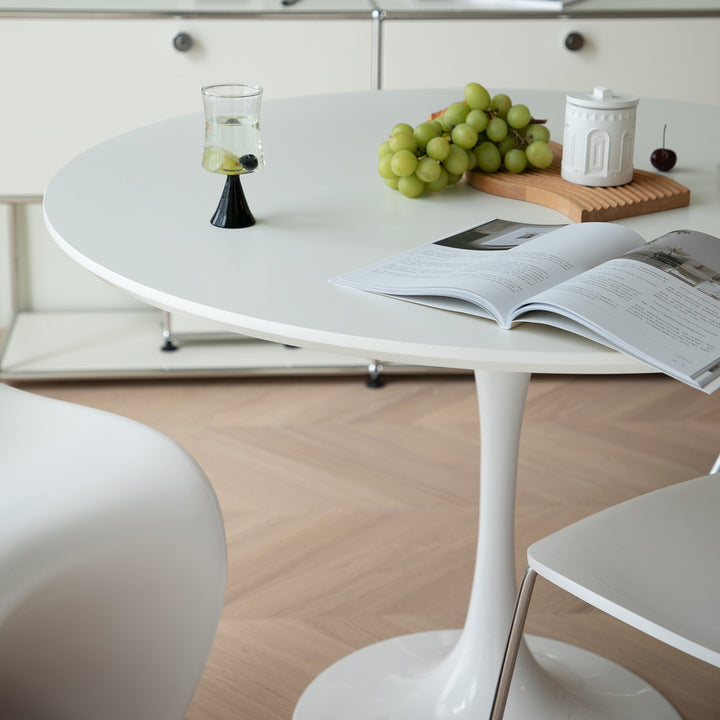 Minimalist plywood round dining table tulip with context.