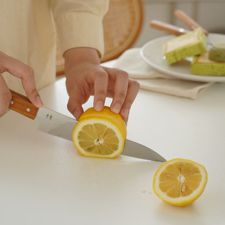 Minimalist plywood round dining table tulip in close up details.