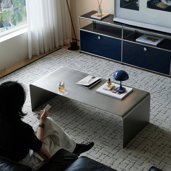 Minimalist steel coffee table arc size charts.
