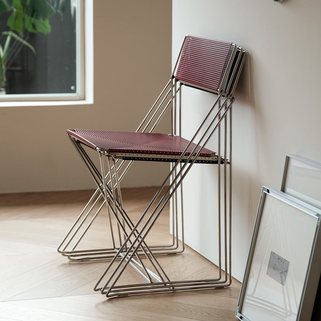 Minimalist steel dining chair x-line conceptual design.