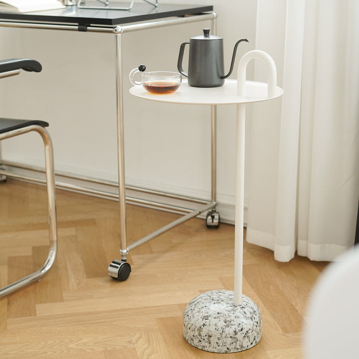 Minimalist steel marble side table loop in still life.