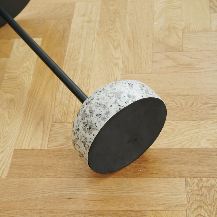 Minimalist steel marble side table loop in panoramic view.