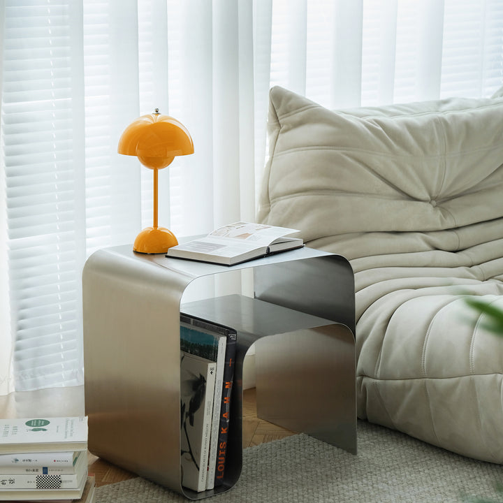 Minimalist steel side table arc primary product view.