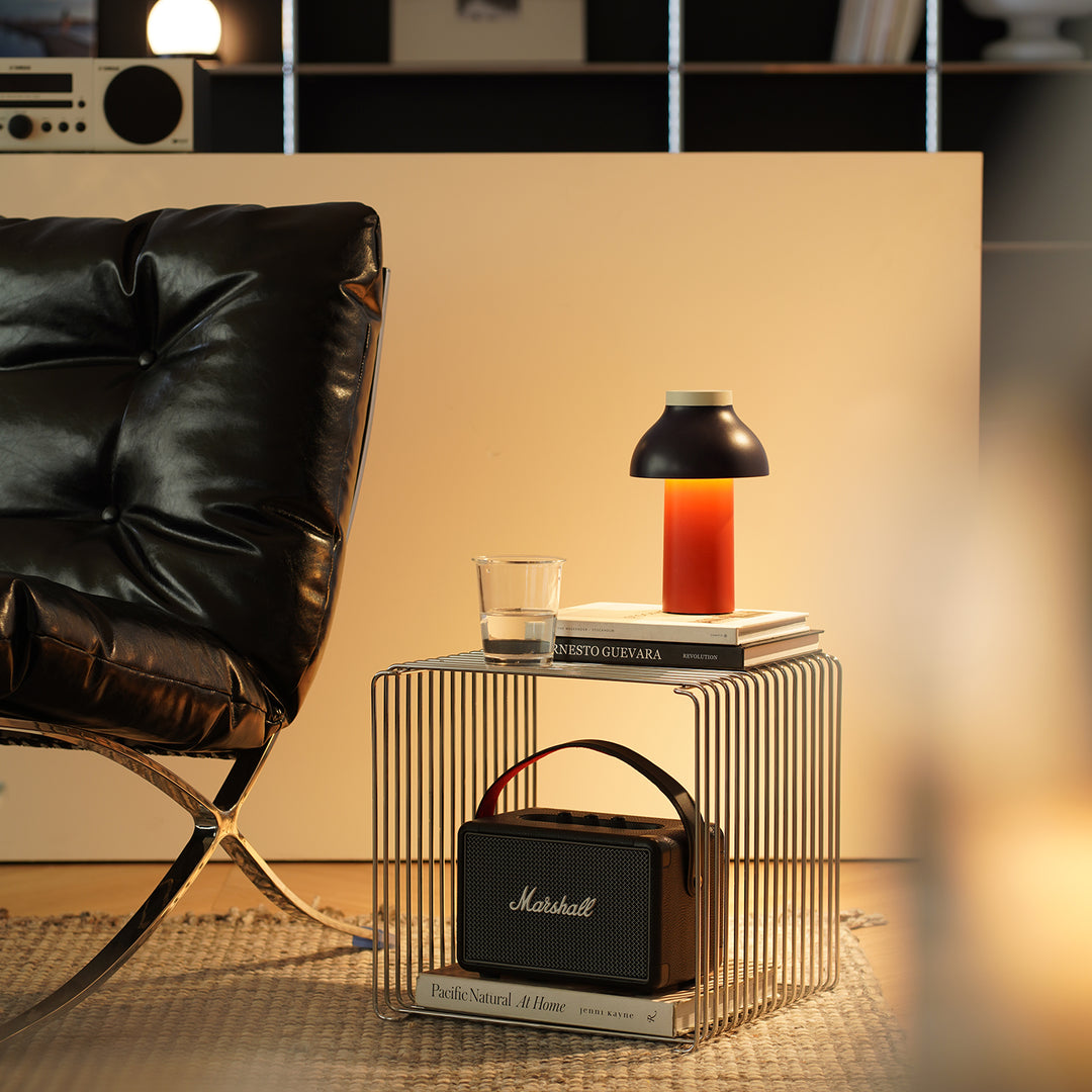 Minimalist steel side table panton wire in close up details.