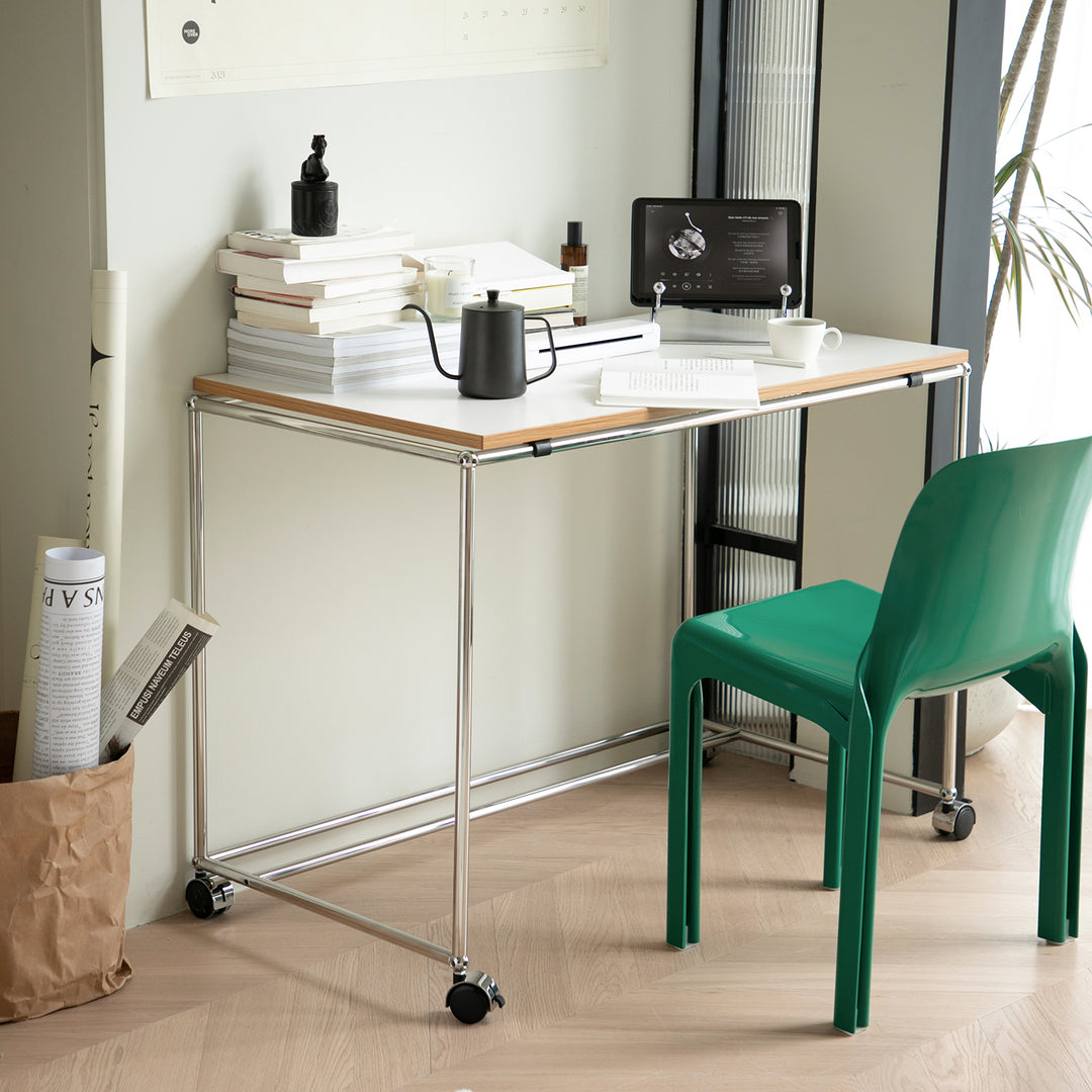 Minimalist steel wheeled study table usm material variants.