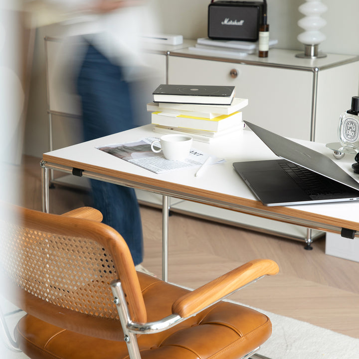 Minimalist steel wheeled study table usm in real life style.