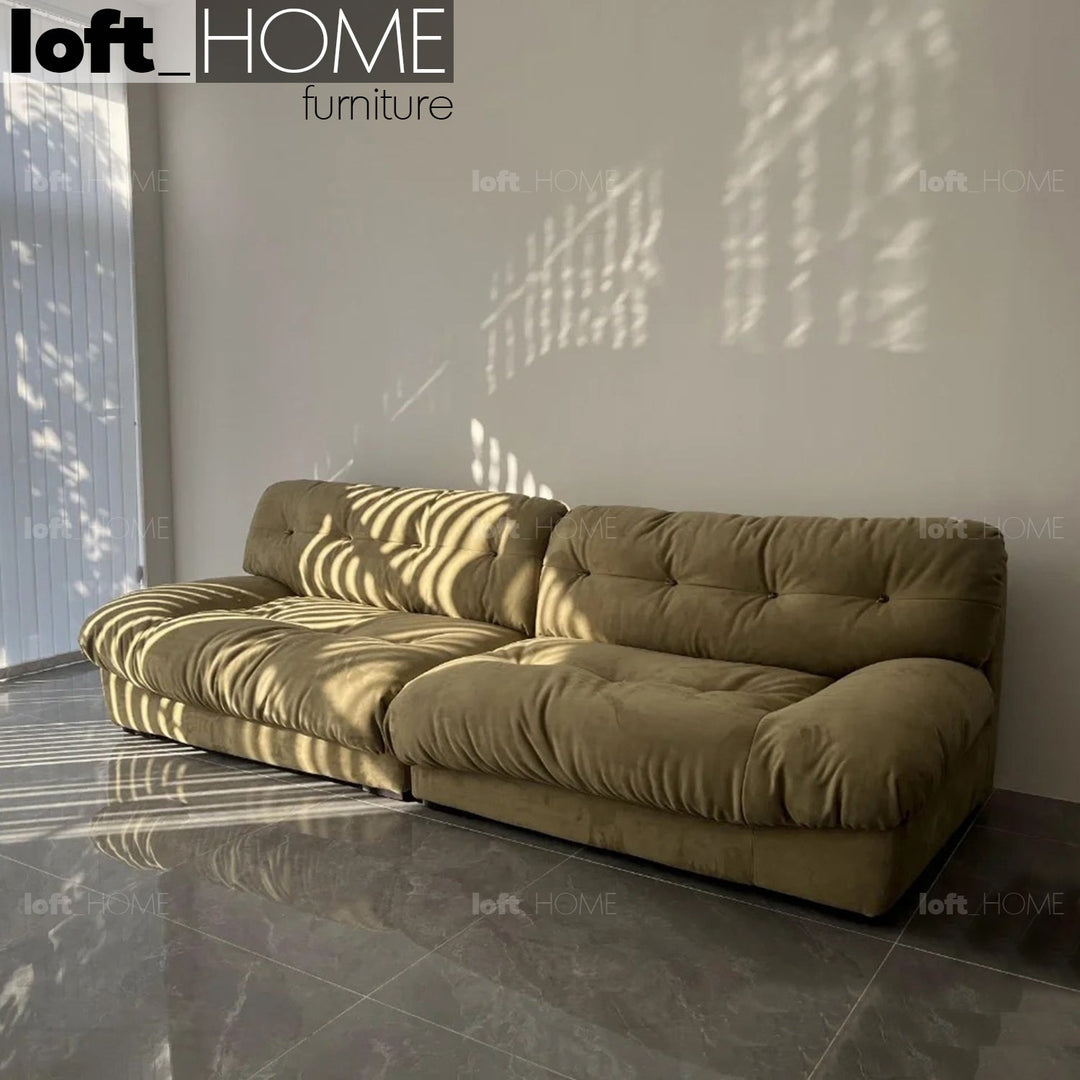 Minimalist suede fabric 4 seater sofa milano in still life.