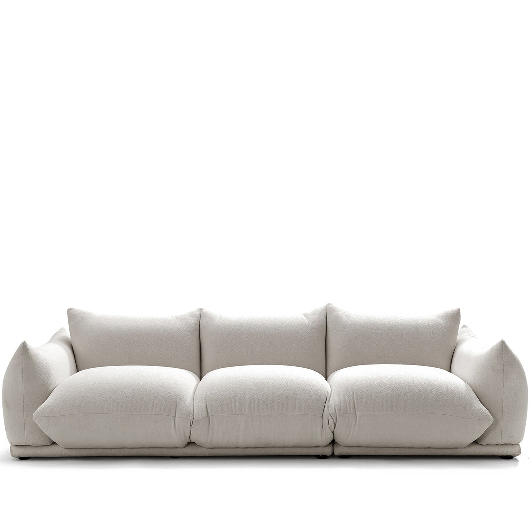 Minimalist teddy fabric 3 seater sofa marenco in white background.