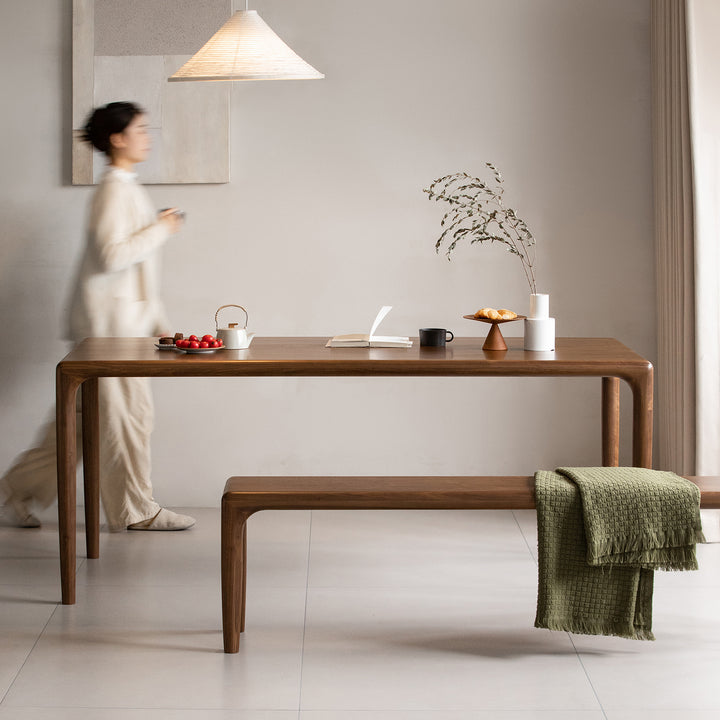 Mininalist walnut wood dining table conti primary product view.