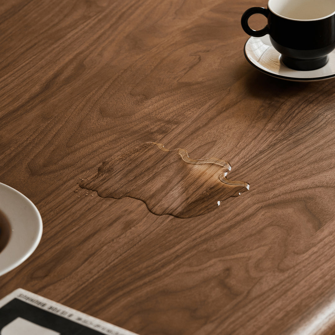 Mininalist walnut wood dining table conti in still life.