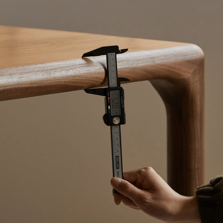 Mininalist walnut wood dining table conti material variants.