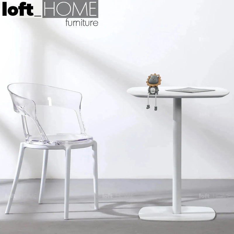 Minimalist wood dining table fane with context.