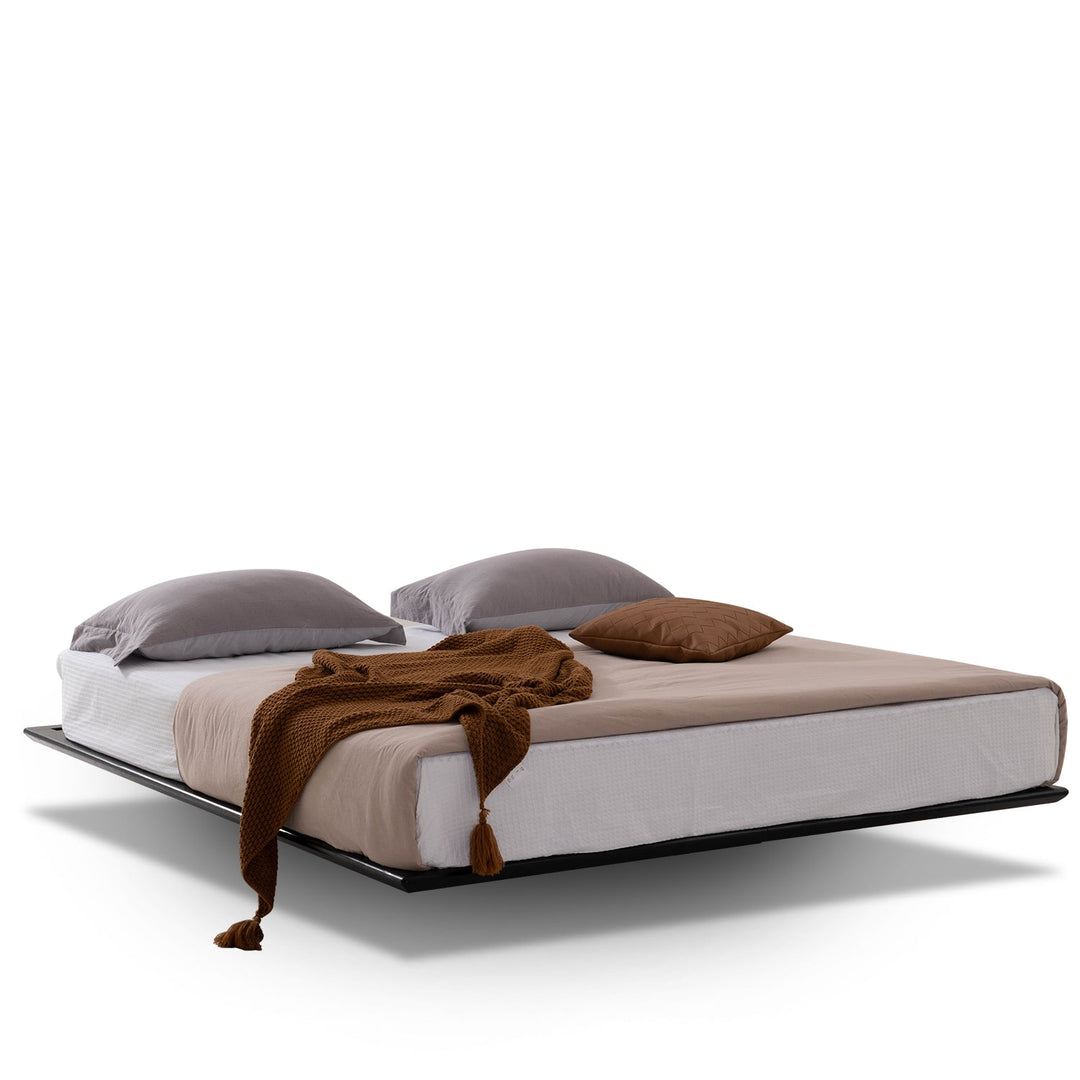 Minimalist wood floating bed anja in white background.