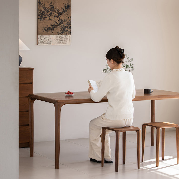 Minimalist walnut wood stool conti in details.