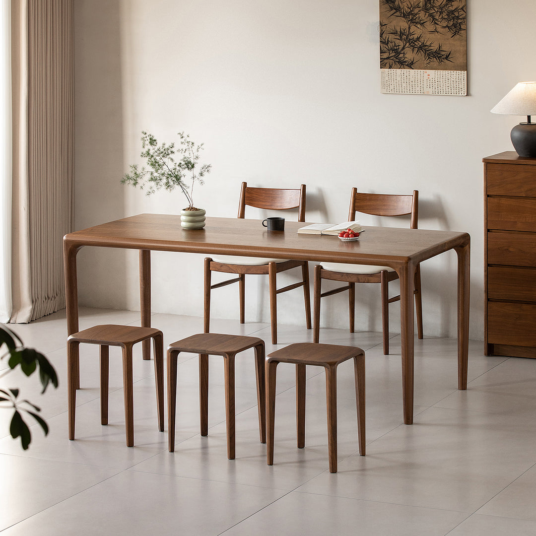 Minimalist walnut wood stool conti in panoramic view.