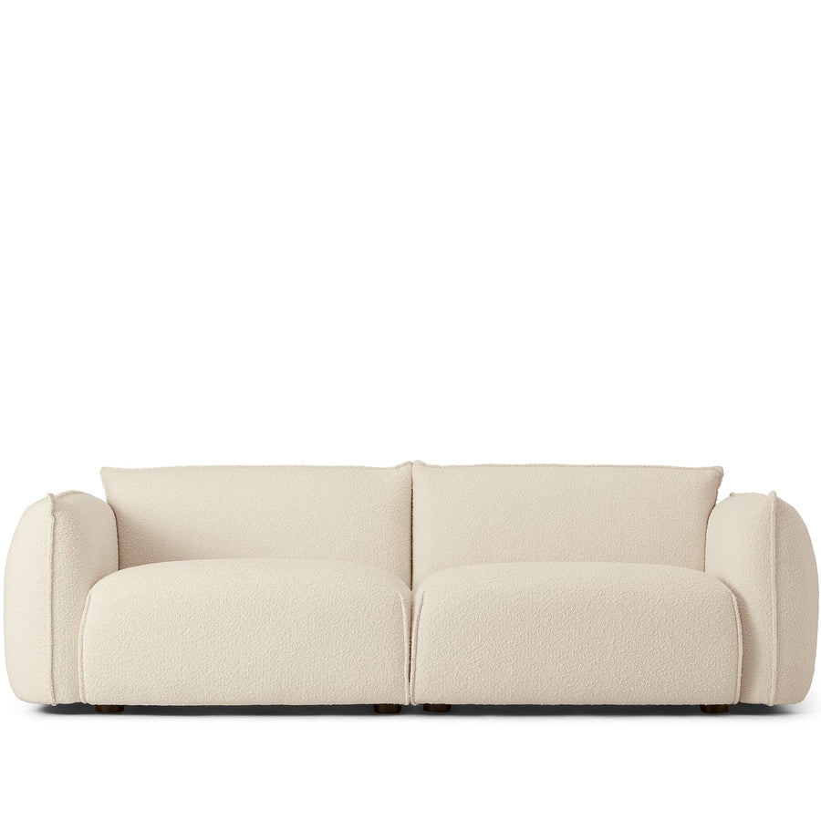 Modern boucle 3 seater sofa dion in white background.