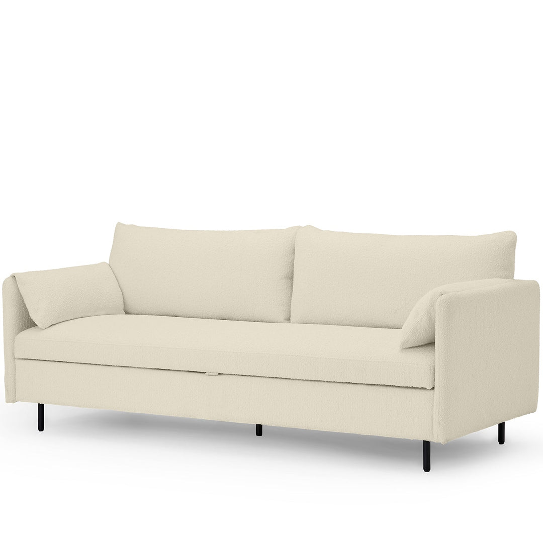 Modern boucle sofa bed hitomi whitewash in still life.