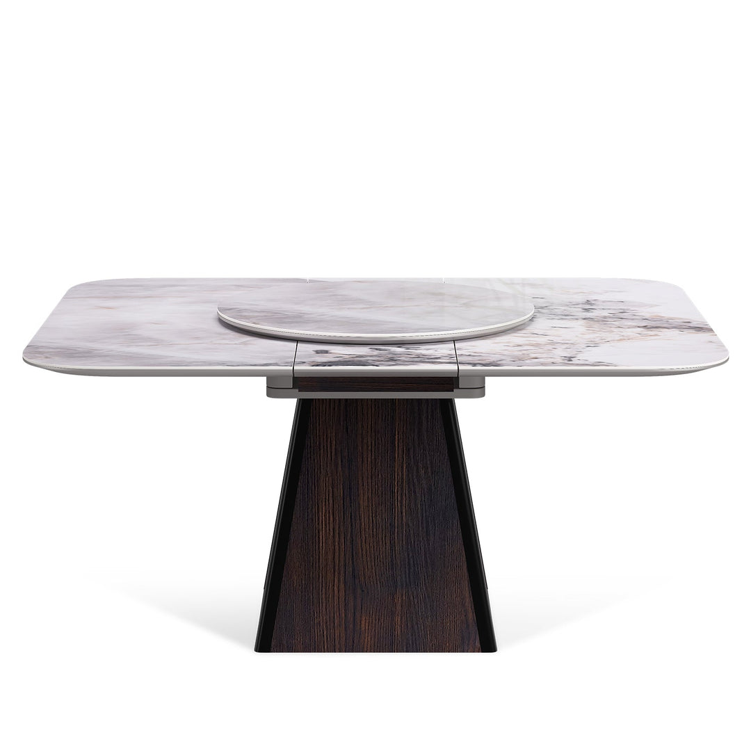 Modern extendable sintered stone dining table dale in white background.