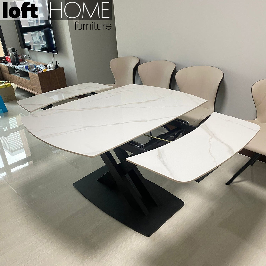 Modern extendable sintered stone dining table luvia in panoramic view.