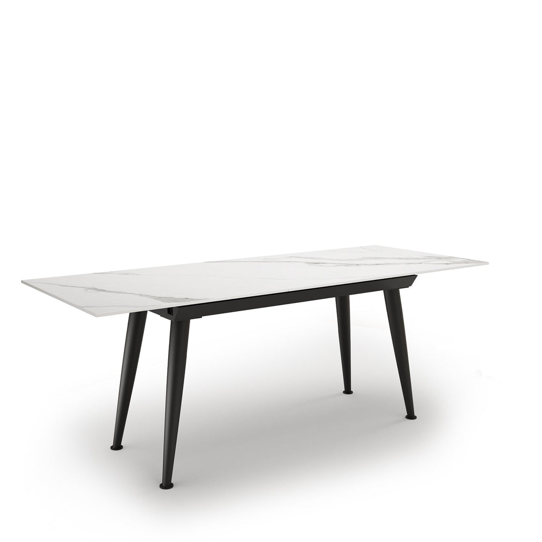 Modern extendable sintered stone dining table nieve in close up details.