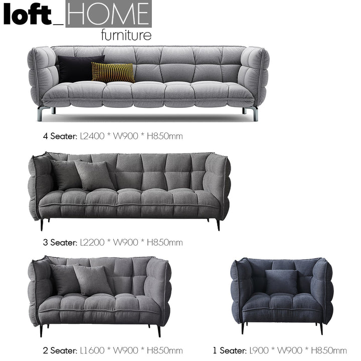 Modern fabric 1 seater sofa husk in real life style.