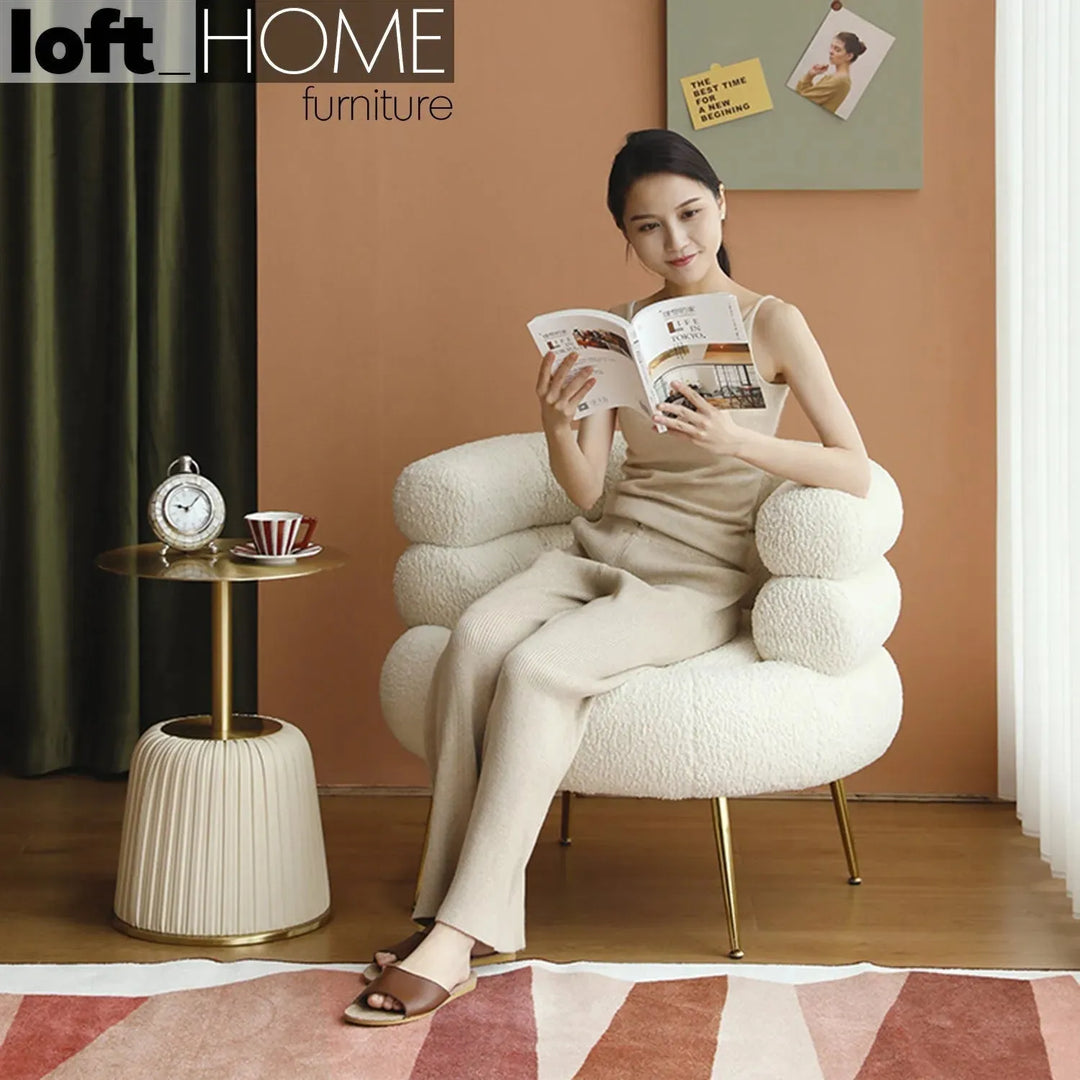 Cream fabric 1 seater sofa sheepskin material variants.
