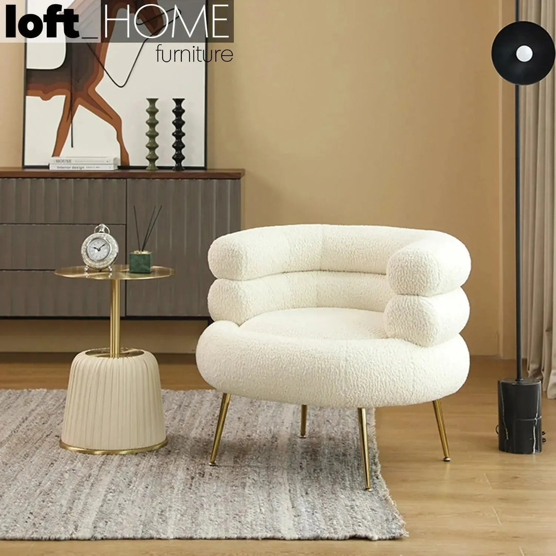 Cream fabric 1 seater sofa sheepskin in real life style.