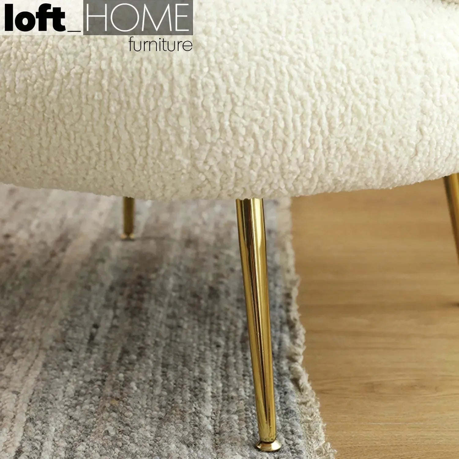 Cream fabric 1 seater sofa sheepskin in close up details.