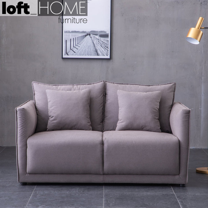 Modern fabric 2 seater sofa adam primary product view.