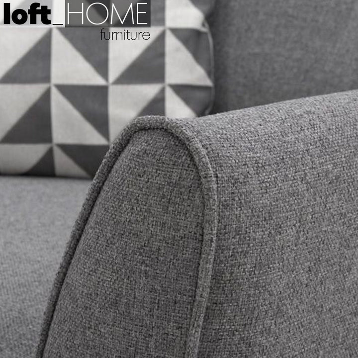 Modern fabric 2 seater sofa henri in close up details.