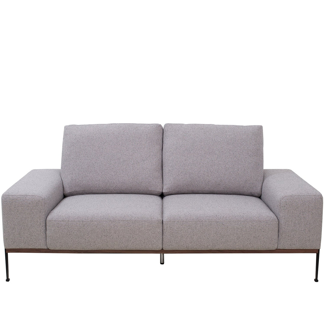 Modern fabric 2 seater sofa herron in white background.