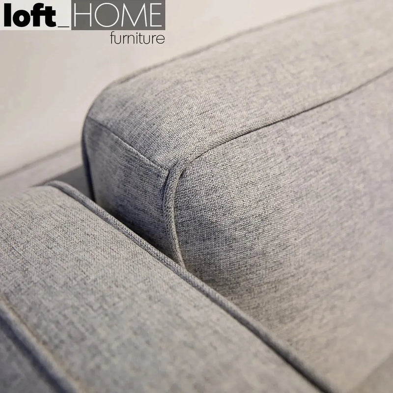 Minimalist fabric 3 seater sofa danny in close up details.