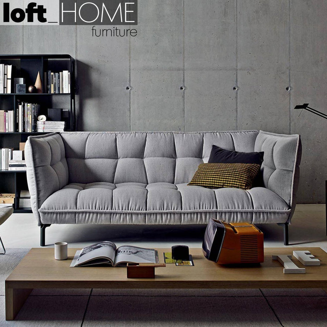 Modern fabric 3 seater sofa husk in details.