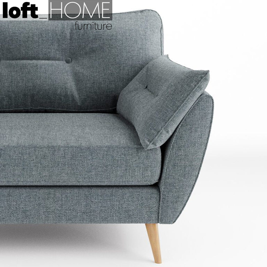 Modern fabric 4 seater sofa henri in close up details.
