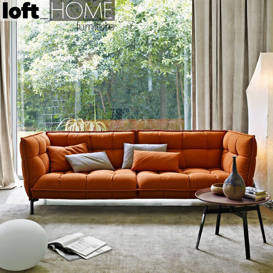 Modern fabric 4 seater sofa husk in details.