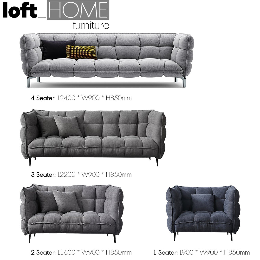 Modern fabric 4 seater sofa husk in real life style.