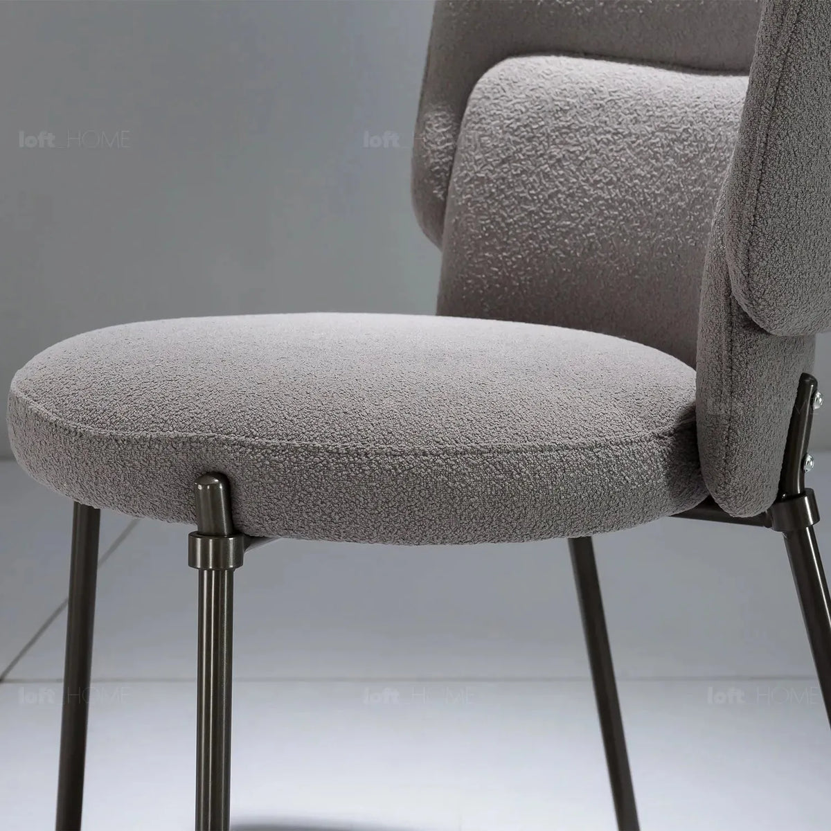 Modern fabric dining chair cloud in close up details.