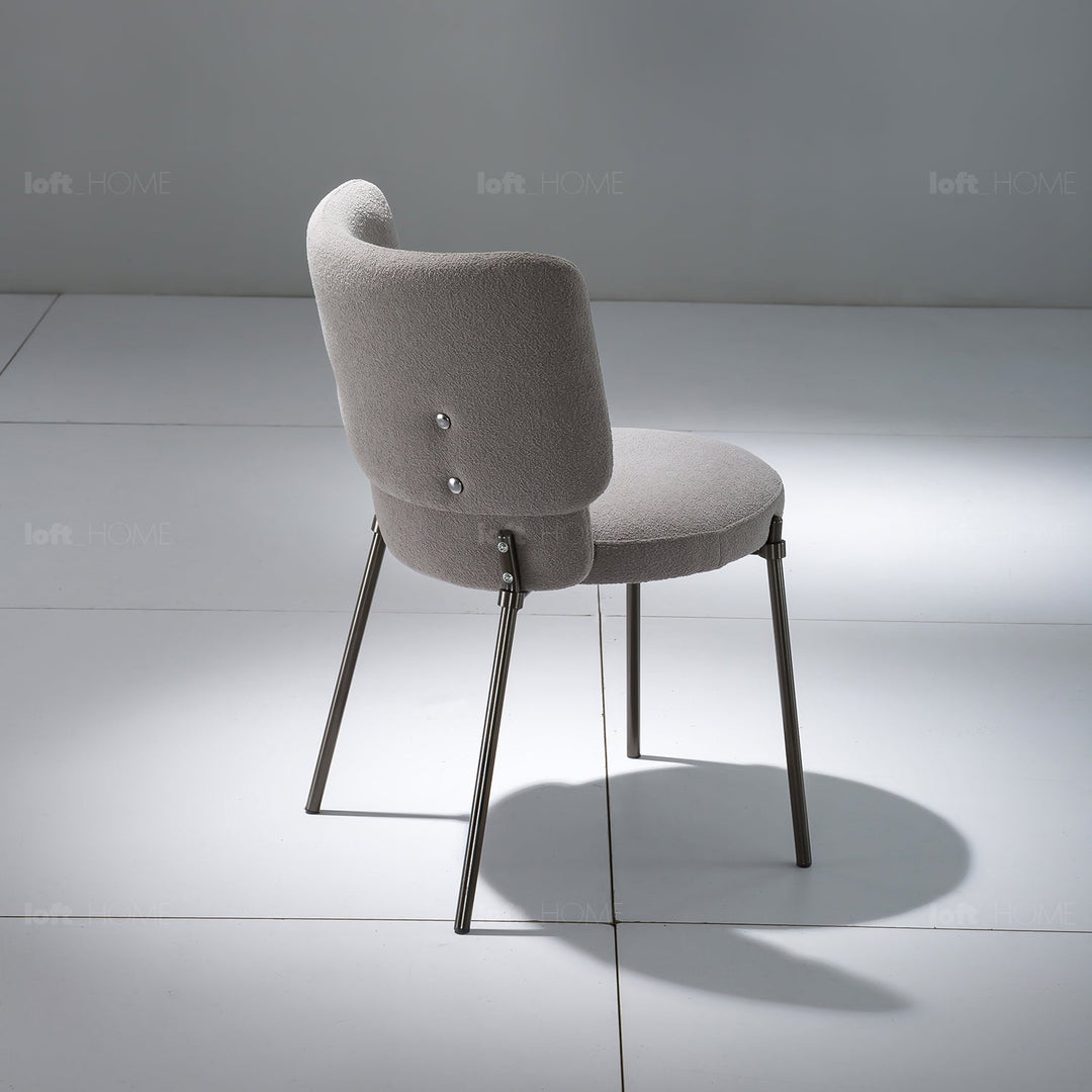 Modern fabric dining chair cloud with context.