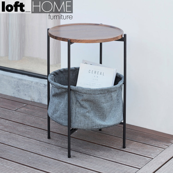 Modern fabric side table emme in still life.